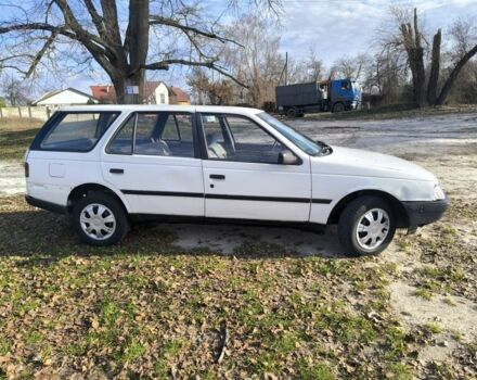 Белый Пежо 405, объемом двигателя 1.9 л и пробегом 293 тыс. км за 1350 $, фото 18 на Automoto.ua