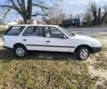 Белый Пежо 405, объемом двигателя 1.9 л и пробегом 293 тыс. км за 1350 $, фото 18 на Automoto.ua