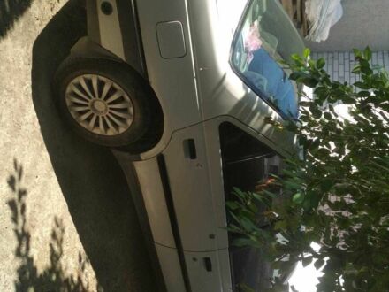 Белый Пежо 405, объемом двигателя 1.4 л и пробегом 190 тыс. км за 650 $, фото 1 на Automoto.ua