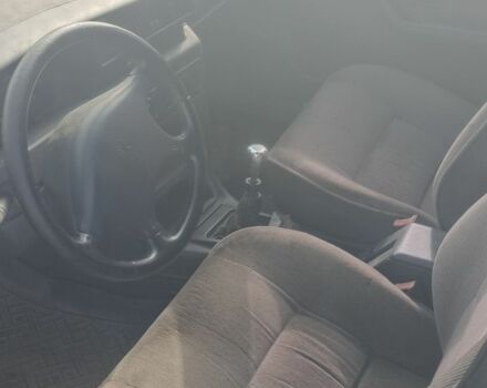 Черный Пежо 405, объемом двигателя 1.9 л и пробегом 141 тыс. км за 358 $, фото 4 на Automoto.ua