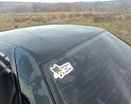 Черный Пежо 405, объемом двигателя 1.9 л и пробегом 270 тыс. км за 700 $, фото 4 на Automoto.ua