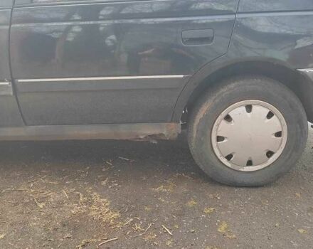 Черный Пежо 405, объемом двигателя 1.6 л и пробегом 280 тыс. км за 600 $, фото 6 на Automoto.ua