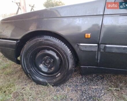 Черный Пежо 405, объемом двигателя 1.9 л и пробегом 555 тыс. км за 1999 $, фото 1 на Automoto.ua
