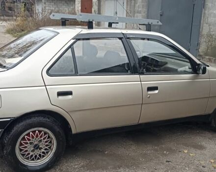 Коричневый Пежо 405, объемом двигателя 1.9 л и пробегом 220 тыс. км за 2500 $, фото 4 на Automoto.ua