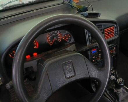 Красный Пежо 405, объемом двигателя 1.4 л и пробегом 230 тыс. км за 900 $, фото 1 на Automoto.ua