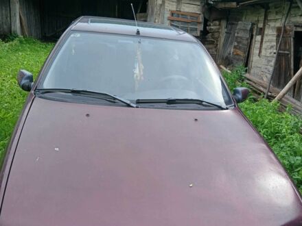 Красный Пежо 405, объемом двигателя 2 л и пробегом 1000 тыс. км за 600 $, фото 1 на Automoto.ua