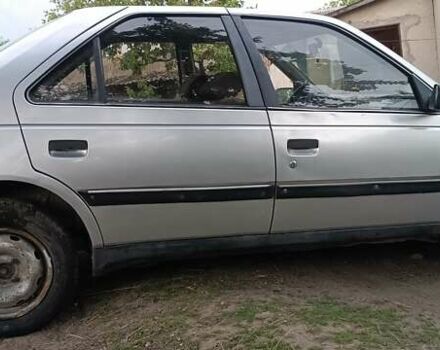 Серый Пежо 405, объемом двигателя 1.9 л и пробегом 220 тыс. км за 475 $, фото 1 на Automoto.ua