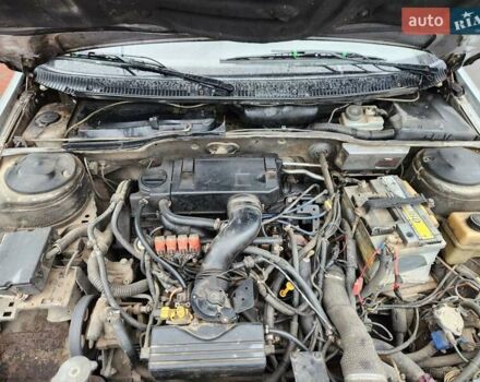 Серый Пежо 405, объемом двигателя 1.99 л и пробегом 355 тыс. км за 870 $, фото 13 на Automoto.ua