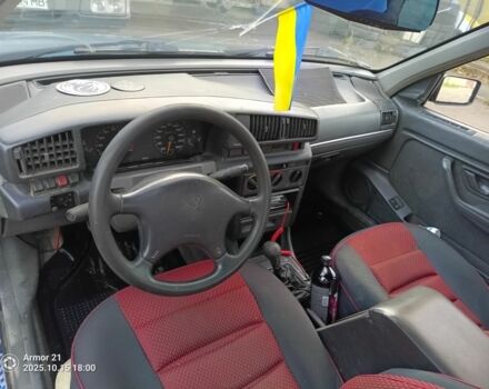 Синий Пежо 405, объемом двигателя 1.9 л и пробегом 400 тыс. км за 1200 $, фото 2 на Automoto.ua