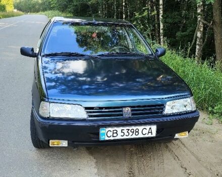 Зеленый Пежо 405, объемом двигателя 1.9 л и пробегом 250 тыс. км за 1700 $, фото 1 на Automoto.ua