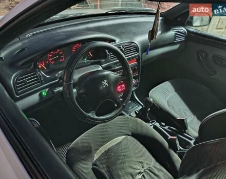 Белый Пежо 406, объемом двигателя 1.76 л и пробегом 200 тыс. км за 1850 $, фото 23 на Automoto.ua