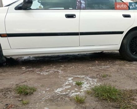 Белый Пежо 406, объемом двигателя 1.76 л и пробегом 200 тыс. км за 1850 $, фото 9 на Automoto.ua