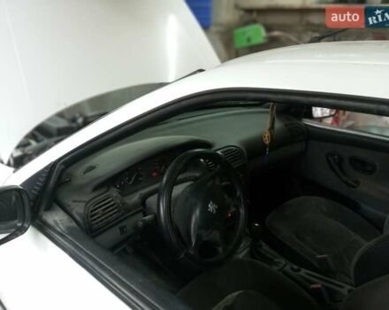 Белый Пежо 406, объемом двигателя 1.76 л и пробегом 200 тыс. км за 1850 $, фото 1 на Automoto.ua