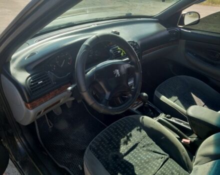 Черный Пежо 406, объемом двигателя 2 л и пробегом 340 тыс. км за 2500 $, фото 2 на Automoto.ua