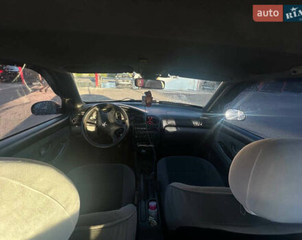 Черный Пежо 406, объемом двигателя 1.8 л и пробегом 202 тыс. км за 2300 $, фото 7 на Automoto.ua