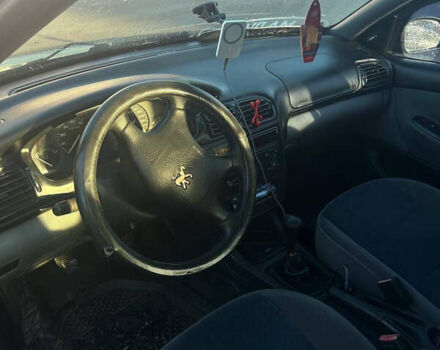 Черный Пежо 406, объемом двигателя 1.8 л и пробегом 202 тыс. км за 2300 $, фото 9 на Automoto.ua