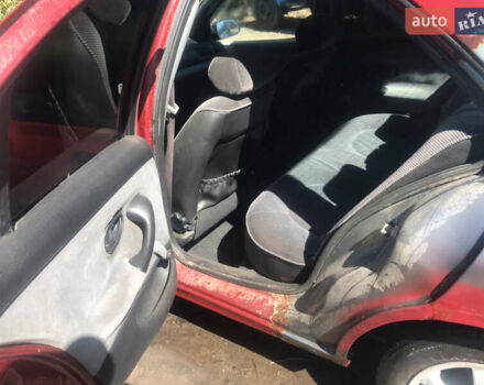 Красный Пежо 406, объемом двигателя 1.76 л и пробегом 332 тыс. км за 1250 $, фото 1 на Automoto.ua