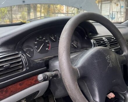 Серый Пежо 406, объемом двигателя 2 л и пробегом 244 тыс. км за 1100 $, фото 4 на Automoto.ua
