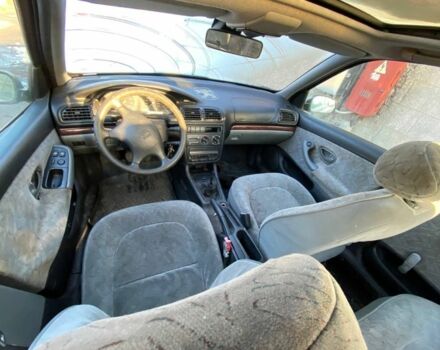 Серый Пежо 406, объемом двигателя 1.8 л и пробегом 400 тыс. км за 650 $, фото 4 на Automoto.ua