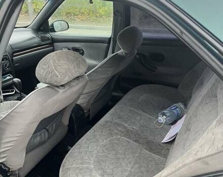 Зеленый Пежо 406, объемом двигателя 1.8 л и пробегом 270 тыс. км за 3000 $, фото 5 на Automoto.ua