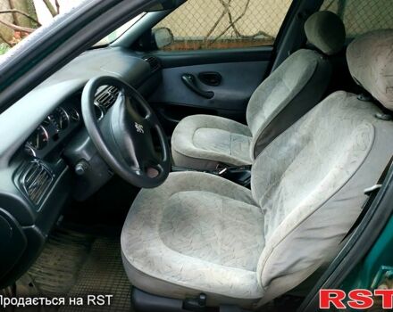 Зеленый Пежо 406, объемом двигателя 1.8 л и пробегом 350 тыс. км за 2000 $, фото 4 на Automoto.ua