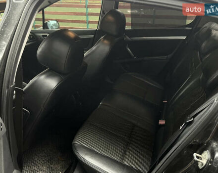 Черный Пежо 407, объемом двигателя 2.23 л и пробегом 257 тыс. км за 4299 $, фото 10 на Automoto.ua