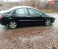 Черный Пежо 407, объемом двигателя 2 л и пробегом 300 тыс. км за 2999 $, фото 1 на Automoto.ua