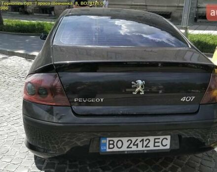 Черный Пежо 407, объемом двигателя 1.8 л и пробегом 225 тыс. км за 4439 $, фото 1 на Automoto.ua