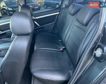 Чорний Пежо 407, об'ємом двигуна 1.8 л та пробігом 280 тис. км за 4290 $, фото 32 на Automoto.ua