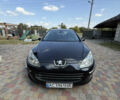 Черный Пежо 407, объемом двигателя 2 л и пробегом 210 тыс. км за 5500 $, фото 1 на Automoto.ua