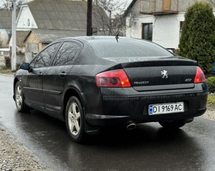 Черный Пежо 407, объемом двигателя 1.8 л и пробегом 220 тыс. км за 3999 $, фото 4 на Automoto.ua