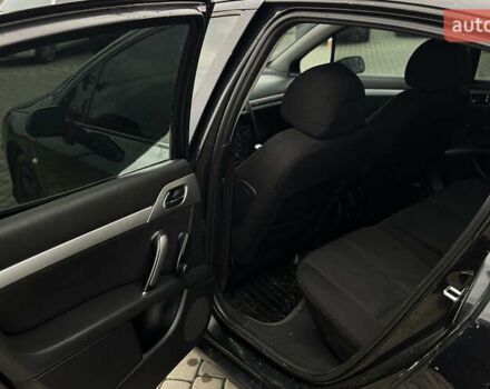Черный Пежо 407, объемом двигателя 1.75 л и пробегом 238 тыс. км за 3700 $, фото 18 на Automoto.ua