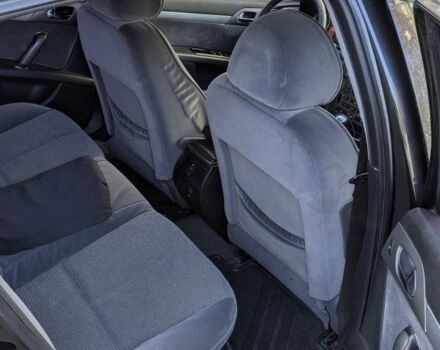 Черный Пежо 407, объемом двигателя 2 л и пробегом 220 тыс. км за 2902 $, фото 6 на Automoto.ua