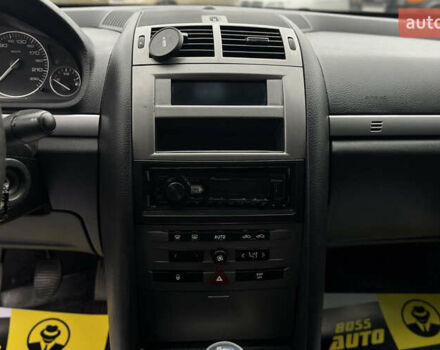 Черный Пежо 407, объемом двигателя 1.75 л и пробегом 238 тыс. км за 3700 $, фото 11 на Automoto.ua