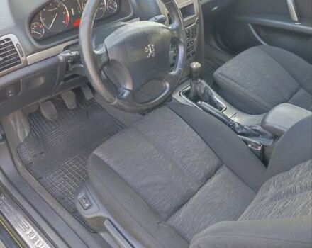 Черный Пежо 407, объемом двигателя 1.6 л и пробегом 242 тыс. км за 4500 $, фото 11 на Automoto.ua