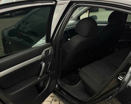 Черный Пежо 407, объемом двигателя 1.7 л и пробегом 238 тыс. км за 3700 $, фото 20 на Automoto.ua