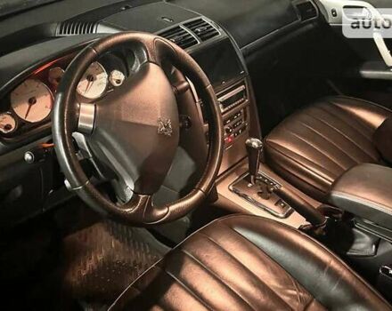 Черный Пежо 407, объемом двигателя 2.72 л и пробегом 300 тыс. км за 4800 $, фото 1 на Automoto.ua