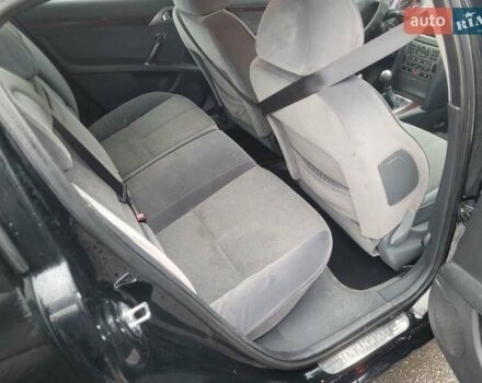 Черный Пежо 407, объемом двигателя 1.56 л и пробегом 250 тыс. км за 2600 $, фото 9 на Automoto.ua