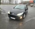 Черный Пежо 407, объемом двигателя 1.56 л и пробегом 250 тыс. км за 2600 $, фото 1 на Automoto.ua
