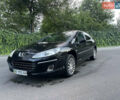 Черный Пежо 407, объемом двигателя 2 л и пробегом 474 тыс. км за 3700 $, фото 1 на Automoto.ua