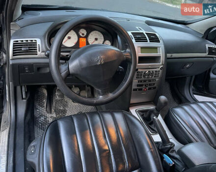 Черный Пежо 407, объемом двигателя 2 л и пробегом 474 тыс. км за 3700 $, фото 5 на Automoto.ua