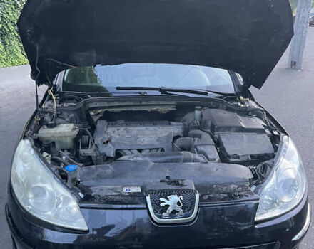 Черный Пежо 407, объемом двигателя 2 л и пробегом 474 тыс. км за 3700 $, фото 1 на Automoto.ua