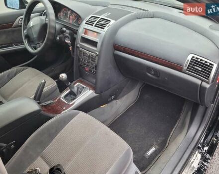 Черный Пежо 407, объемом двигателя 1.56 л и пробегом 250 тыс. км за 2600 $, фото 10 на Automoto.ua