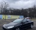 Черный Пежо 407, объемом двигателя 1.8 л и пробегом 258 тыс. км за 5300 $, фото 1 на Automoto.ua