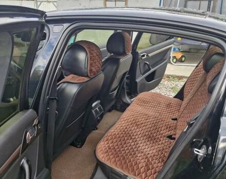 Черный Пежо 407, объемом двигателя 2.01 л и пробегом 290 тыс. км за 5300 $, фото 12 на Automoto.ua