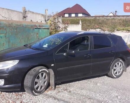 Черный Пежо 407, объемом двигателя 1.6 л и пробегом 285 тыс. км за 4800 $, фото 1 на Automoto.ua
