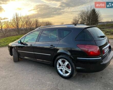 Черный Пежо 407, объемом двигателя 2 л и пробегом 307 тыс. км за 5100 $, фото 14 на Automoto.ua