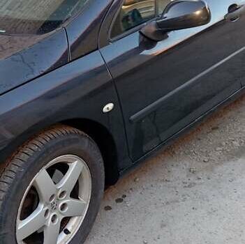 Чорний Пежо 407, об'ємом двигуна 2 л та пробігом 330 тис. км за 4000 $, фото 1 на Automoto.ua