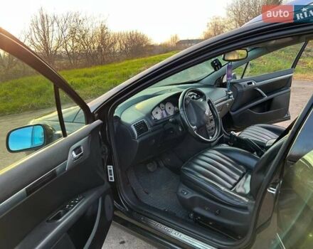 Черный Пежо 407, объемом двигателя 2 л и пробегом 307 тыс. км за 5100 $, фото 13 на Automoto.ua