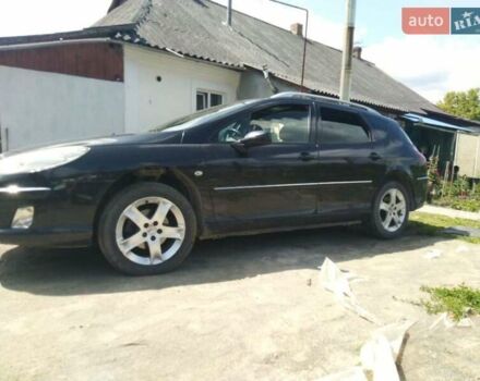 Черный Пежо 407, объемом двигателя 2 л и пробегом 320 тыс. км за 4200 $, фото 1 на Automoto.ua